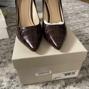 Brown leather pumps